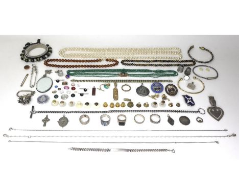 A group of gold, silver and costume jewellery, including a 9ct gold bar brooch, an Egyptian yellow metal pendant cast with hi