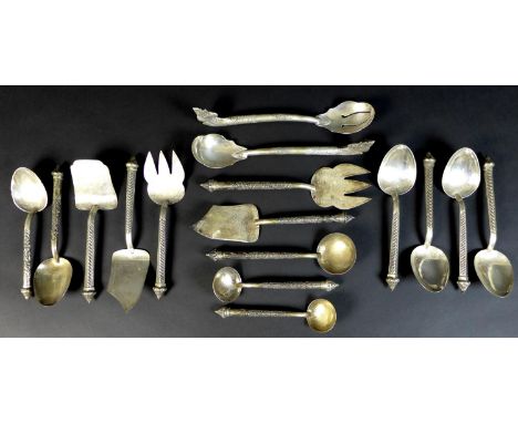 A large collection of Cambodian Khmer silver serving utensils, comprising three graduated ladles, four large serving spoons, 