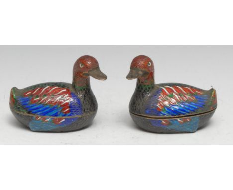 A pair of Chinese cloisonne enamel boxes and covers, as ducks, brightly decorated in polychrome, gilt interiors and bases, 9c