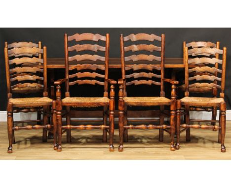 A Titchmarsh &amp; Goodwin oak refectory trestle dining table, 76cm high, 183cm long, 80.5cm wide; a set of six conforming La