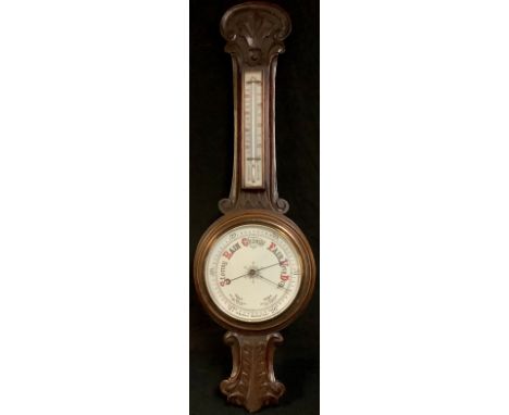 An early 20th century oak aneroid wheel barometer, with thermometer, 88cm 