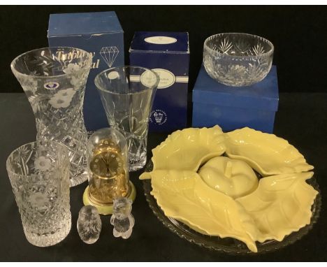 A Tutbury Crystal cut glass vase, 25cm, boxed; a Royal Doulton Evesham pattern cut glass vase, boxed; a cut glass bowl and va