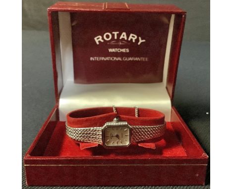A lady's Rotary stainless steel watch, silvered dial, baton indicators, integral bracelet strap, number 2091, boxed 