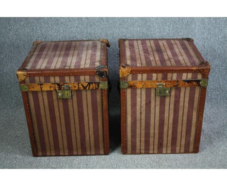 A pair of vintage leather and metal bound steamer trunks. H.60 W.50 D.50cm. (each) 