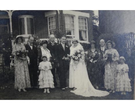 A vintage framed wedding photograph. Southend. Signed by the photographer. Circa 1920. H.42 W.50 cm. 