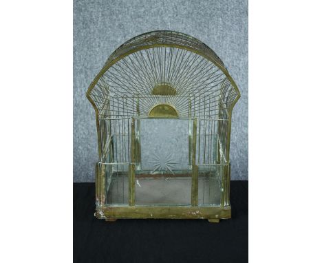 A vintage metal birdcage with a glazed door. H.42 W.33 D.24 cm. 