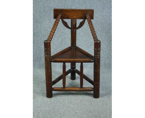 Turners chair, 19th century oak with bobbin turned arms. H.92 W.62 D.49cm. 