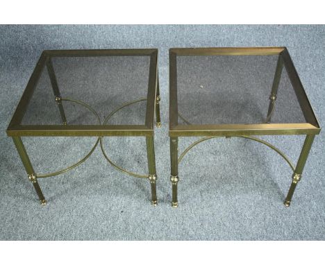 Pair of vintage brass lamp tables with smoked glass tops. H.43cm W.46cm 