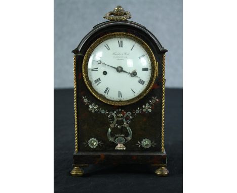 A small early 19th century Thwaites &amp; Reed, Clerkenwell mantel clock, tortoiseshell with mother of pearl inlay decoration