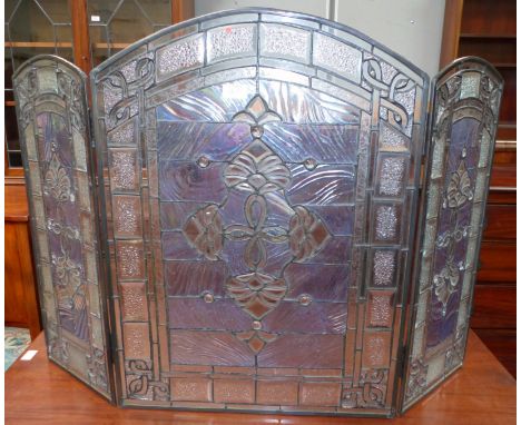 A leaded and coloured 3 panel firescreen; fender and companion set