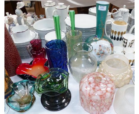 A selection of coloured glassware including vases, lamp shades etc