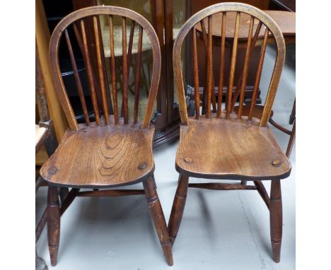 A set of 5 19th century elm hoop and stick back dining chairs with solid seats