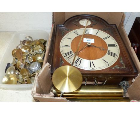 A reproduction German twin weight driven wall clock; a collection of brass and silver plated caddy spoons