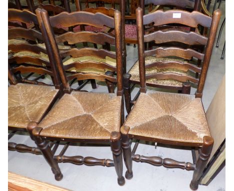 A set of 4 elm rush seat ladder back dining chairs