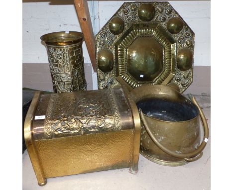 A set of 3 brass fire irons and dogs; a brass coal scuttle; a stick stand; a magazine rack; etc.