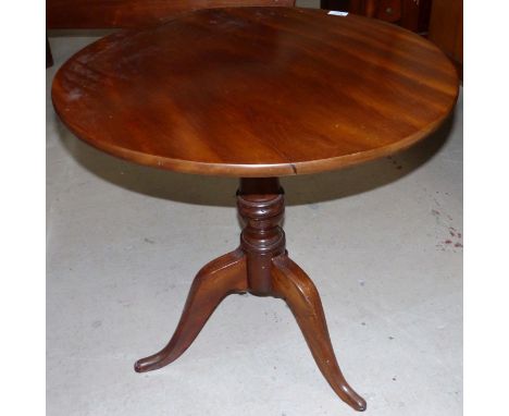 A 19th century mahogany circular tripod table