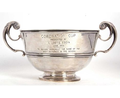 A late Victorian silver twin handled presentation trophy, engraved one side "Coronation Cup" to record annually the name of t