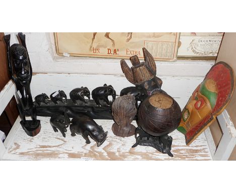 Carved ebony elephants and other tribal art figures