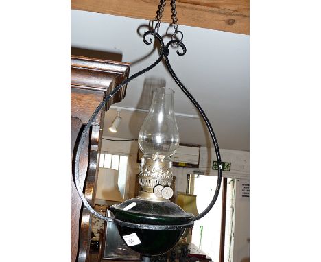 Edwardian Arts &amp; Crafts wrought iron hanging oil lamp with green glass reservoir