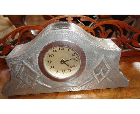 Arts &amp; Crafts pewter cased mantle clock