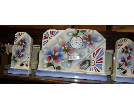 French Art Deco ceramic clock garniture with later movement