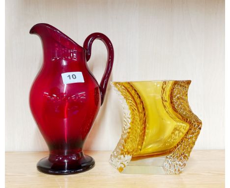 A large Whitefriars ruby glass jug, H. 27cm. Together with a Murano glass vase.