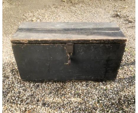 A pine trunk with vintage tool contents.