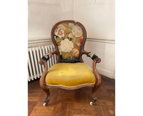 A 19th century tapestry upholstered gentleman's chair