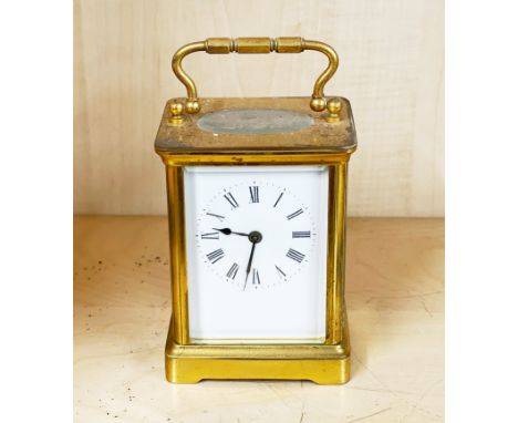 A gilt brass carriage clock, H. 14cm.