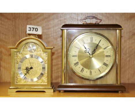 A gilt brass Swiza mechanical mantle clock and a vintage Metamec mantle clock, tallest H. 19cm.