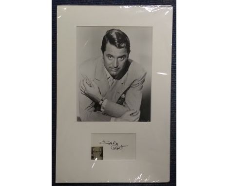Cary Grant signature piece mounted below b/w photo. British-American actor, known as one of classic Hollywood s definitive le