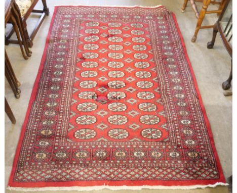 A vintage Bokhara red ground rug 