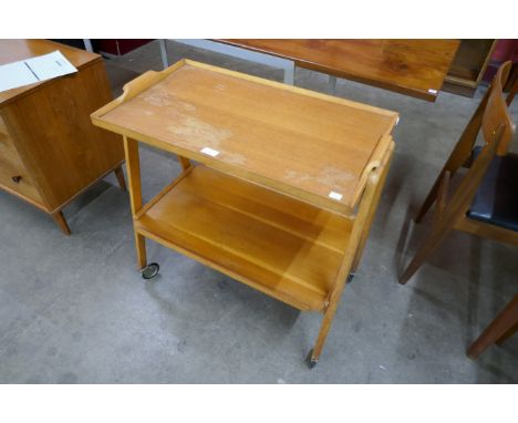 A Danish light oak cocktail trolley 