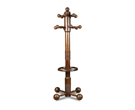 An unusual turned oak hat/coat stand, the central ring turned column with various similarly turned hanging arms with ball fin