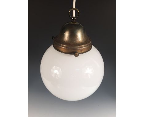 A spherical pendant light, the milk glass globe with brass fitting 34cm (13in)  