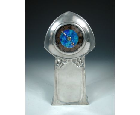 Liberty & Co., a Tudric polished pewter mantel clock designed by Archibald Knox, model number 0371, with embossed copper chap