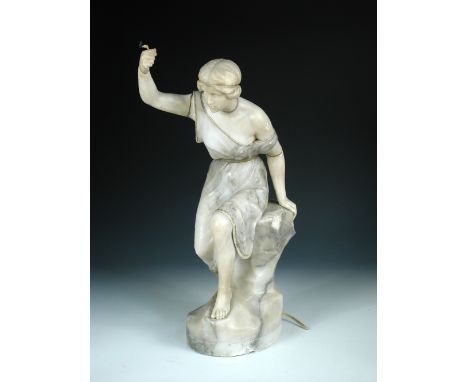A Continental Art Nouveau alabaster figural lamp, signed Pugi, modelled as a classically draped female sitting upon a rock, h