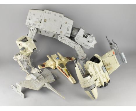 A Collection of Star Wars Vehicles to include 1981 Kenner AT-AT Walker 1984 B-Wing, Kenner Productions X-Wing and 1982 Scout 