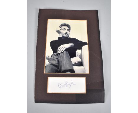 A Black and White Photograph of Bob Dylan with Printed Autograph. NB No Provenance to this Lot