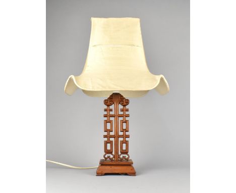 A Modern Carved Wooden Chinese Style Table Lamp with Shade, Overall Height 56cms 