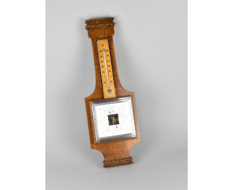 An Art Deco Oak Aneroid Barometer Missing Thermometer together with an Unrelated Thermometer 