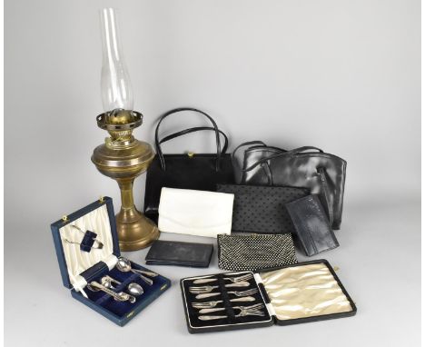A Collection of Sundries to Comprise Brass Oil Lamp, Ladies Purses and Cased Cutlery 