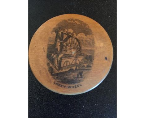 Mauchlin ware featuring Laxey wheel with a compass inside