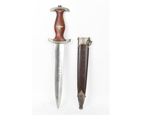 A WWII Second World War Third Reich Nazi German SA Officers dress dagger and scabbard, the dagger having a shaped wooden waln