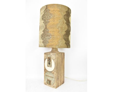 A Troika pottery lamp base by Penny Black, of rectangular form with Aztec designs on a textured brown ground, signed Troika t