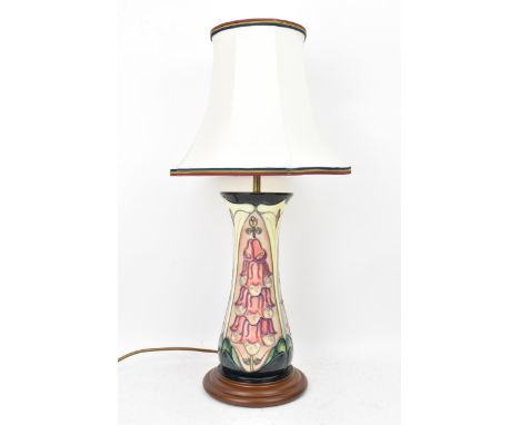 A Moorcroft pottery 'Foxglove' pattern table lamp, designed by Rachel Bishop, of ovoid form tube lined with pink and purple f