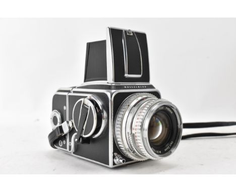 A Hasselblad 500C chrome and black leatherette cased camera, with a Carl Zeiss Synchro Compur 80mm f/2.8 Planar chrome lens 
