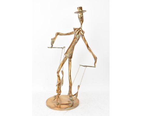 Yves LOHE (1947) A gilded bronze sculpture of a puppet master wearing a top hat, impressed 'LOHE' to the circular base, 46.5c