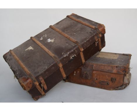 A leather travel trunk inscribed H. J Woodhouse with travel labels, 78 x 45 x 28cm, together with one other