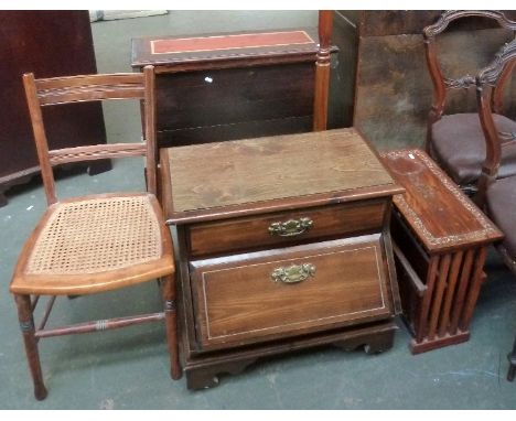 An occasional chair with caned seat, a rosewood inlaid Canterbury, standard lamp and side table